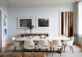 Beautifully decorated dining room with a wooden table, chairs, and stylish decor